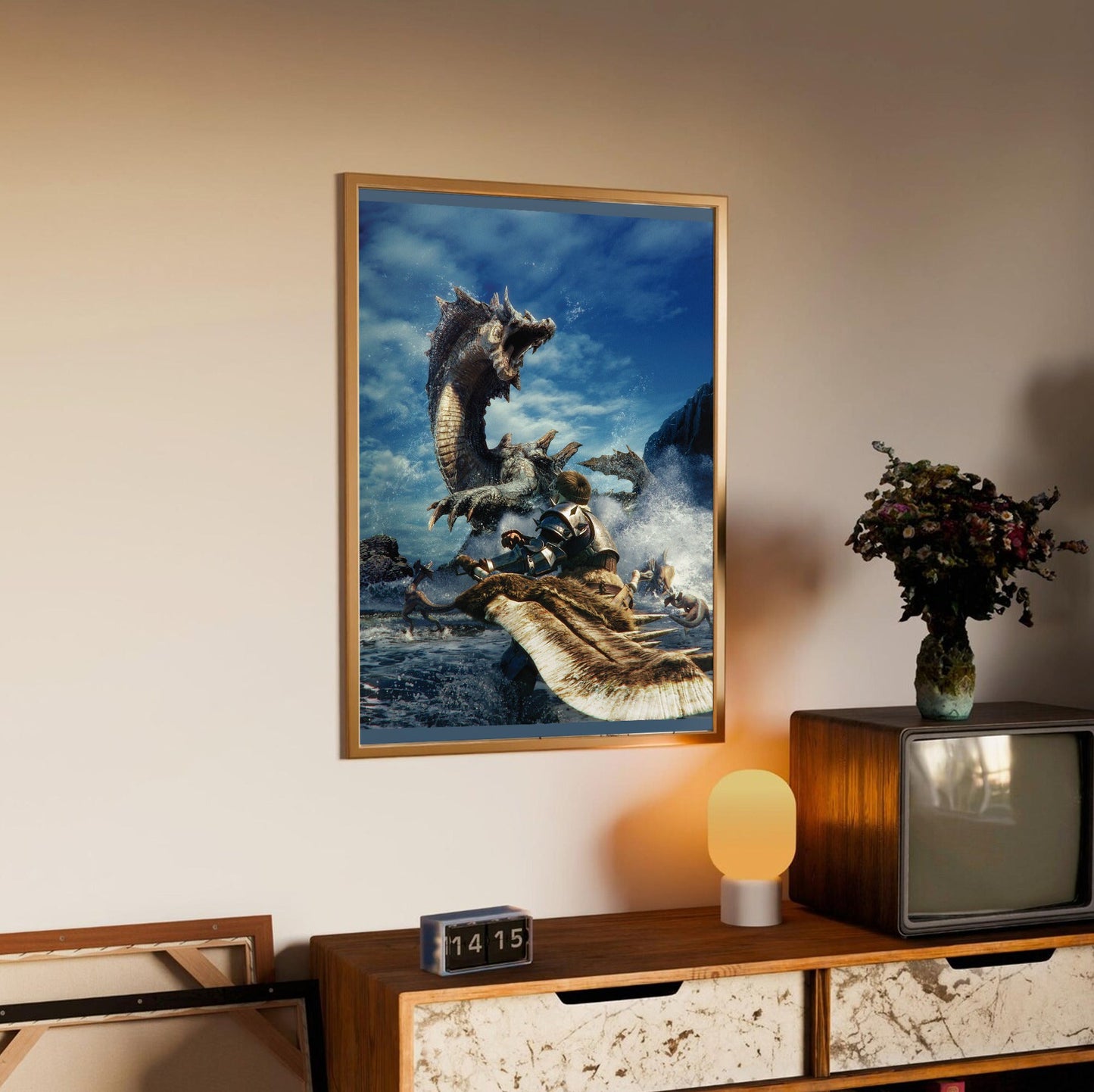 Monster Hunter Tri cover art in an oak frame above a sideboard