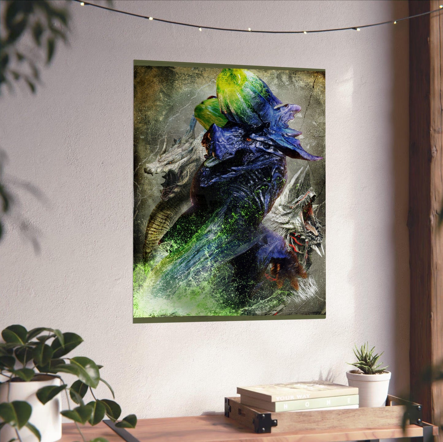 Monster Hunter 3 Ultimate key art unframed on a white wall above a desk