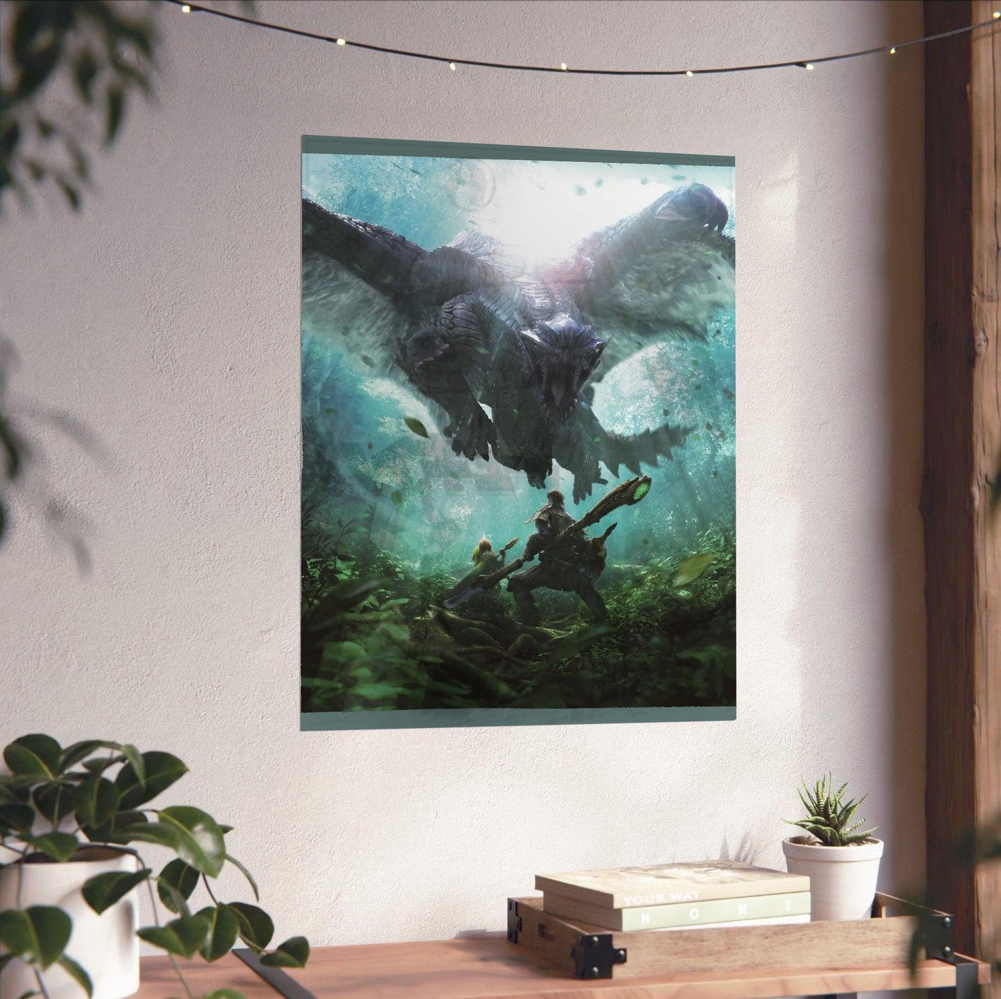 Monster Hunter 4 Ultimate hunter and Felyne vs Gore Magala unframed on a white wall above a desk