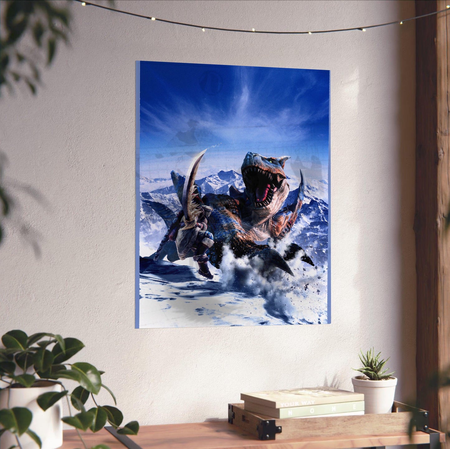 Monster Hunter Freedom 2 main art unframed on a white wall above a desk