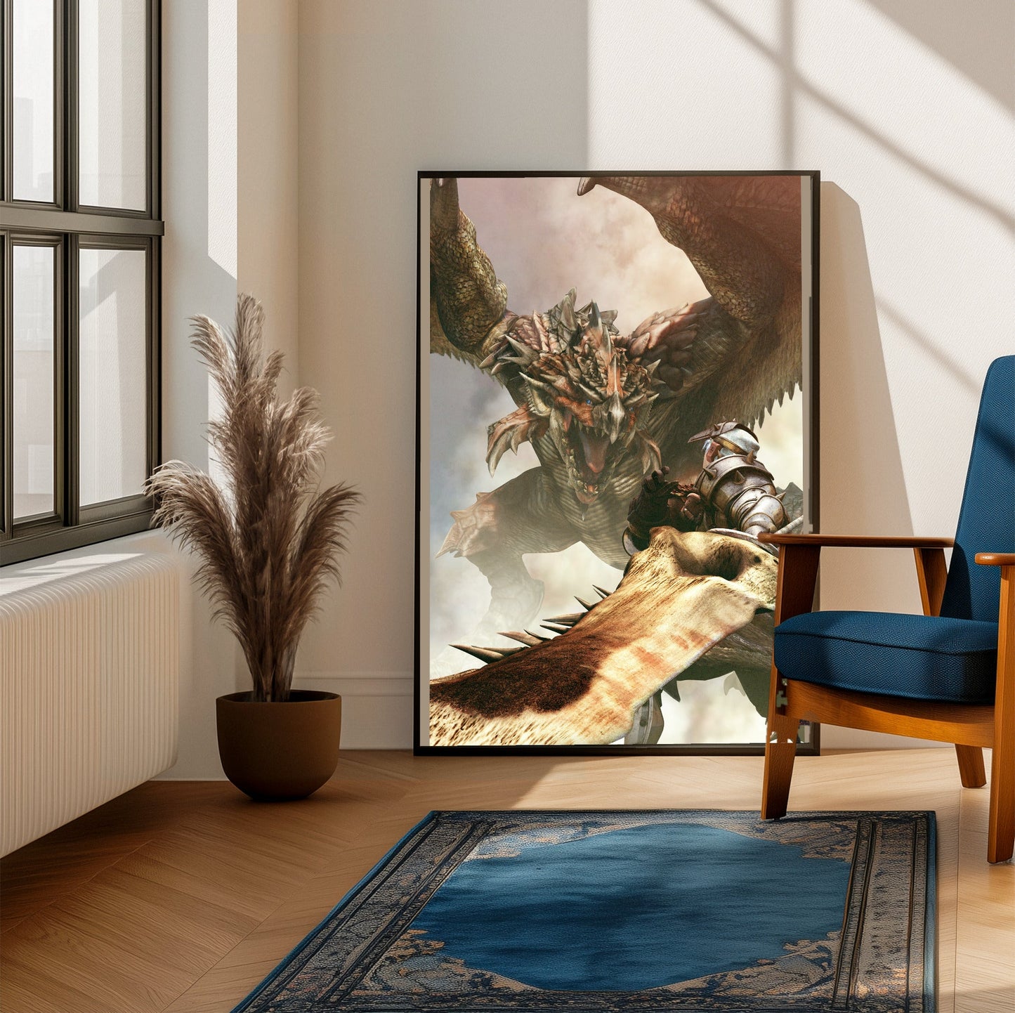Monster Hunter Freedom cover art framed beside a blue armchair in a sunlit room