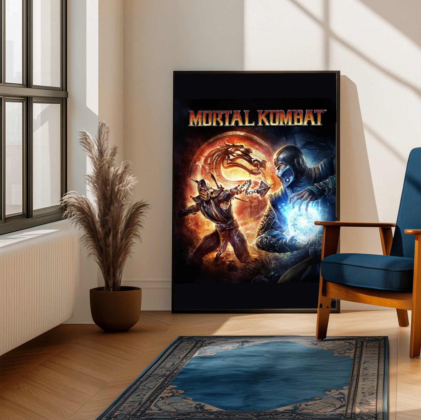 Mortal Kombat 9 cover art with logo framed beside a blue armchair in a sunlit room