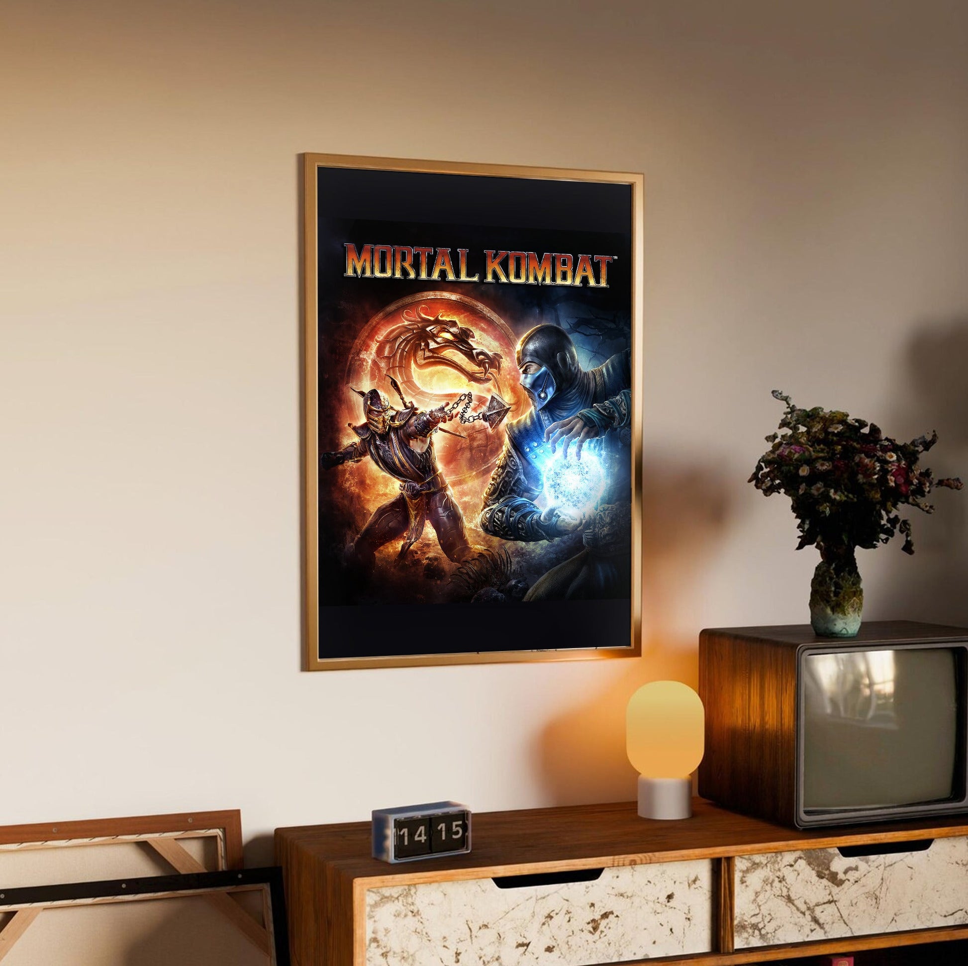 Mortal Kombat 9 cover art with logo in an oak frame above a sideboard