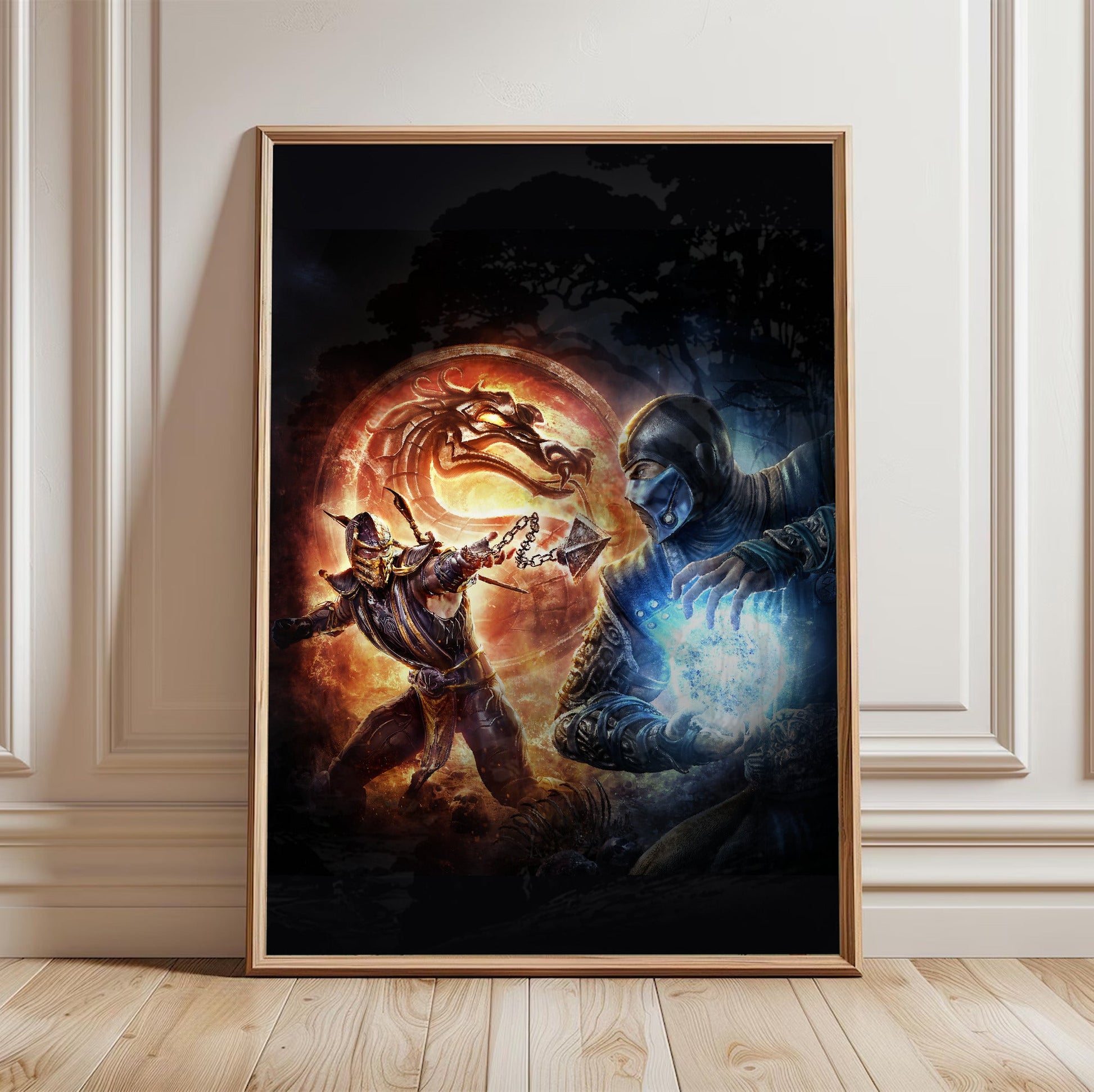 Mortal Kombat 9 Scorpion vs Sub-Zero cover art in a light oak frame leaning against a white wall