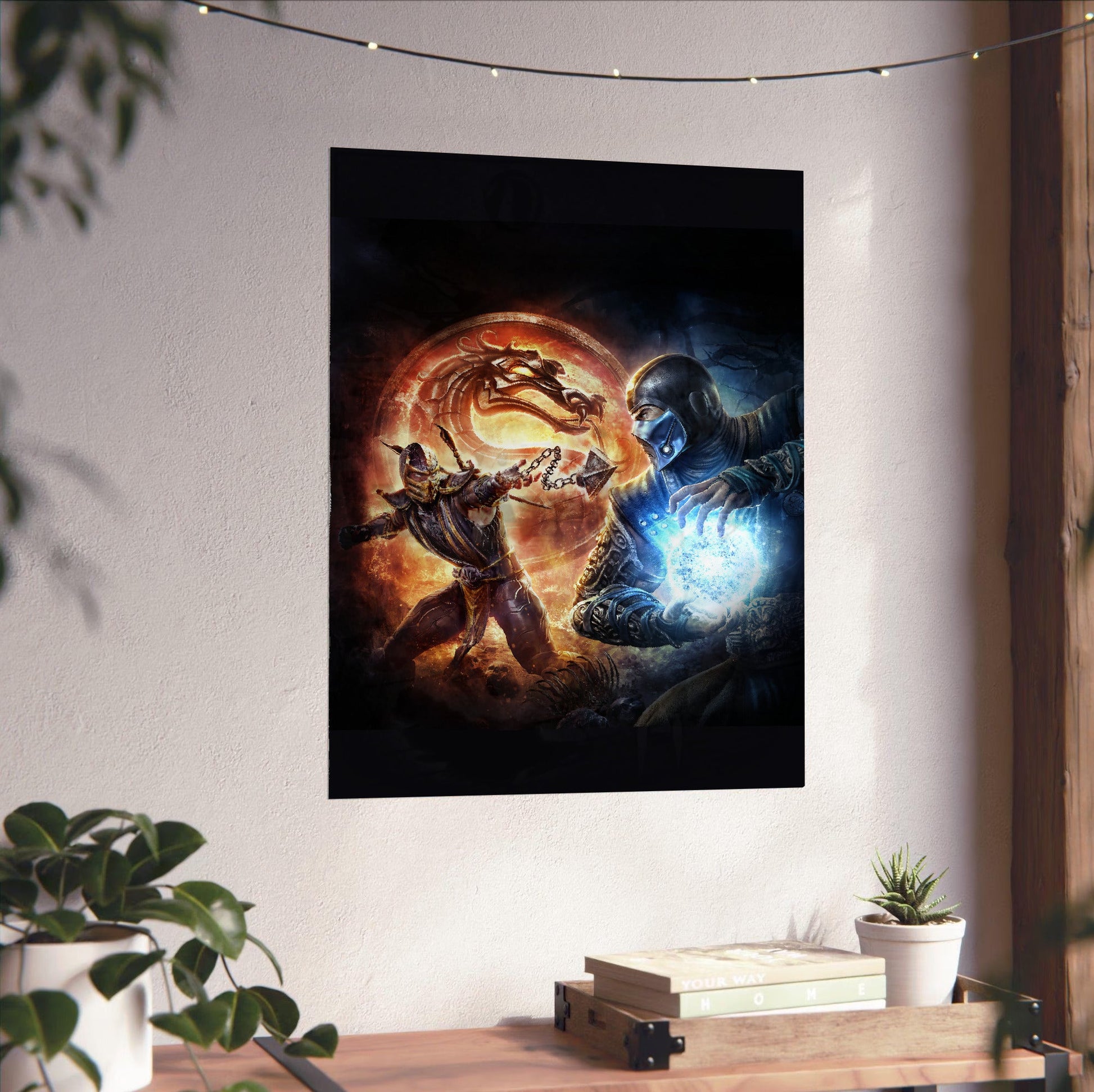 Mortal Kombat 9 Scorpion vs Sub-Zero cover art unframed on a white wall above a desk