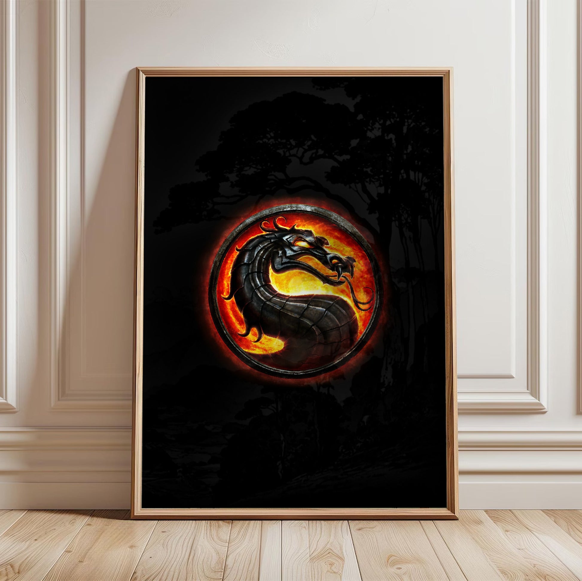 Mortal Kombat dragon emblem in a light oak frame leaning against a white wall