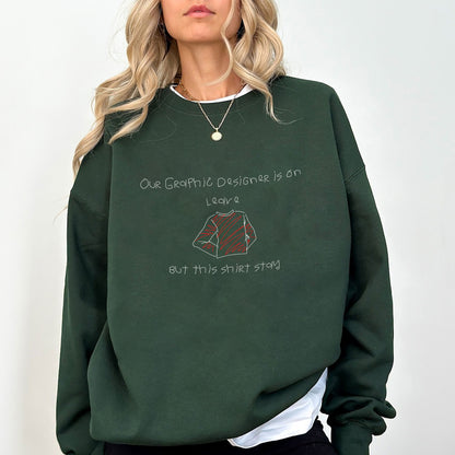Funny Graphic Designer Sweater – “Our Designer Is On Leave” Minimalist Doodle Unisex Crewneck