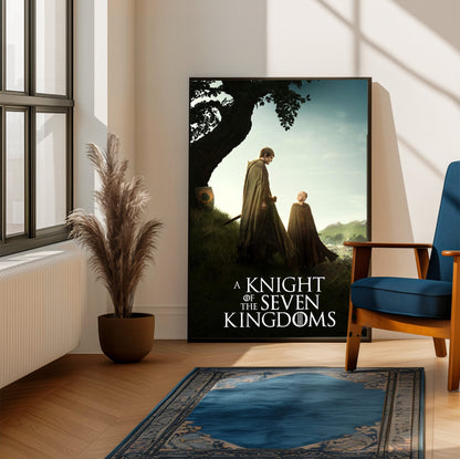 A Knight of the Seven Kingdoms Key Art poster framed beside a blue armchair in a sunlit room