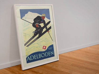 Adelboden Switzerland poster in a white frame leaning against a wall