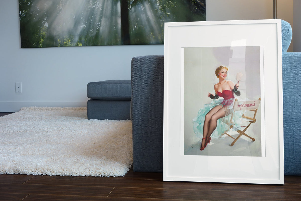 Admiring Miss Sylvania by Gil Elvgren, pin-up poster — living room wall