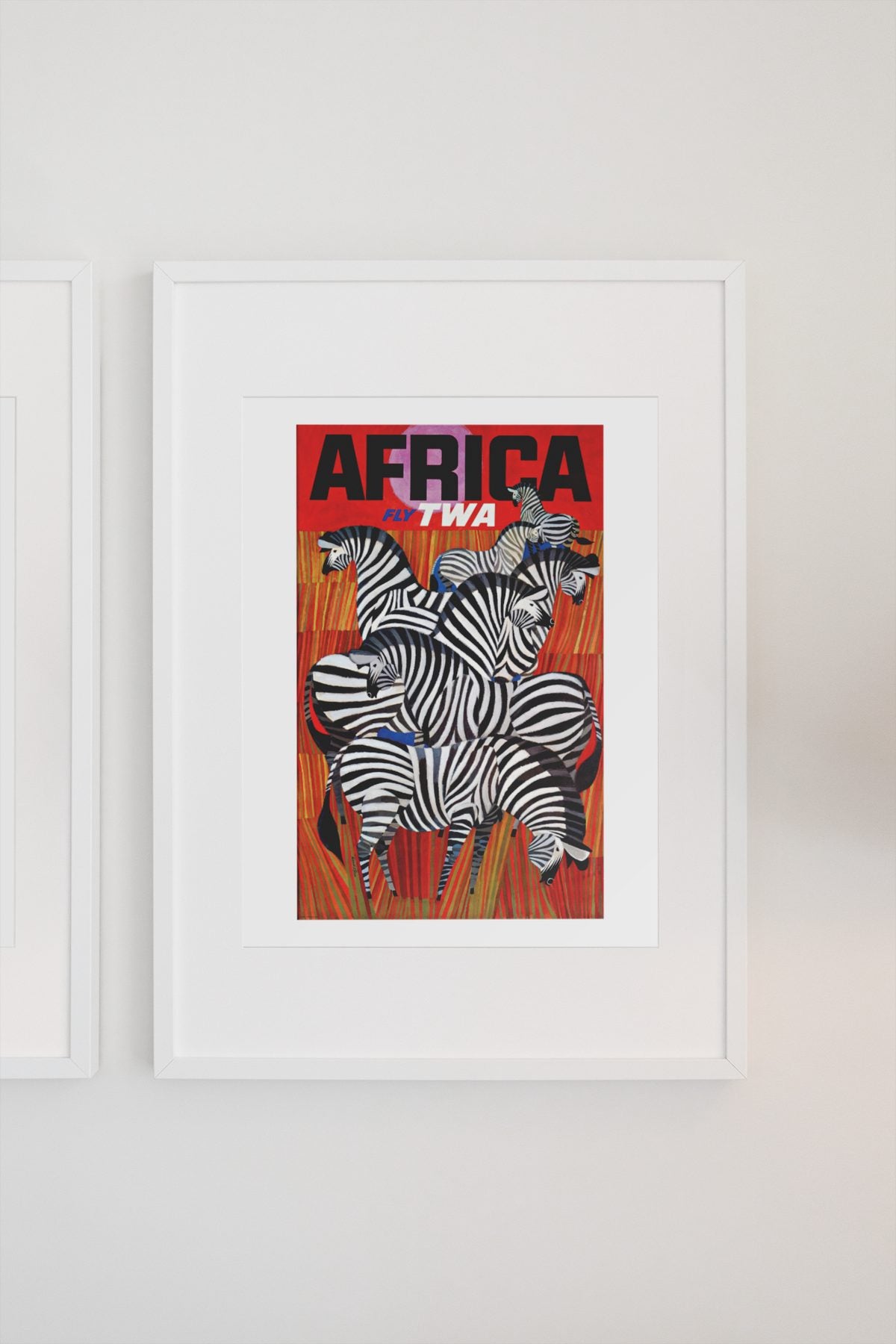 Africa Fly TWA poster on a light wall