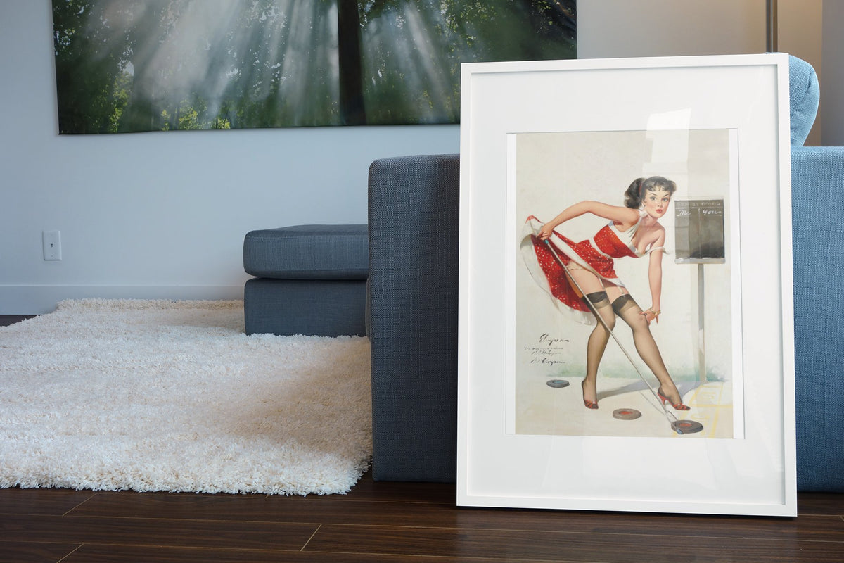 Aiming to Please by Gil Elvgren, pin-up poster — living room wall