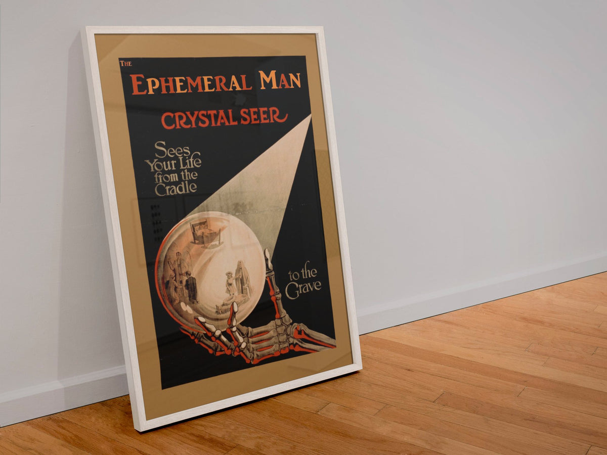 Alexander the Crystal Seer poster in a white frame leaning against a wall