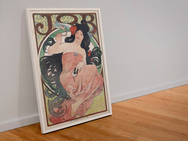 Alphonse Mucha JOB 1898 rolling papers poster in a white frame leaning against a wall