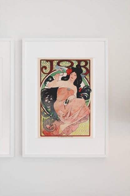 Alphonse Mucha JOB 1898 rolling papers poster in a white frame on a light wall
