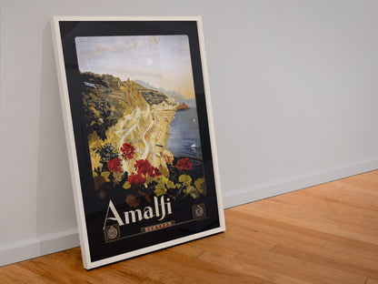 Amalfi Italy poster in a white frame leaning against a wall