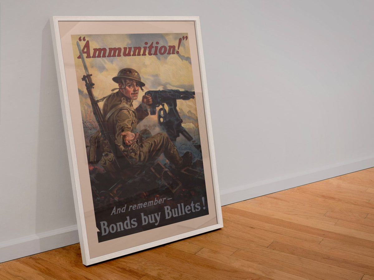 Ammunition Bonds Buy Bullets poster in a white frame leaning against a wall