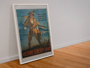 And They Thought We Couldnt Fight poster in a white frame leaning against a wall