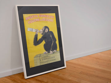 Anisetta Evangelisti 1925 monkey poster in a white frame leaning against a wall