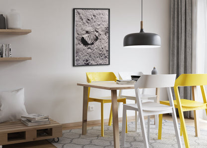 Apollo 11 bootprint on the Moon poster framed above a dining table