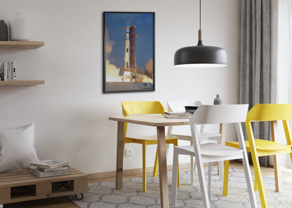 Apollo 11 Saturn V rocket launch poster framed above a dining table