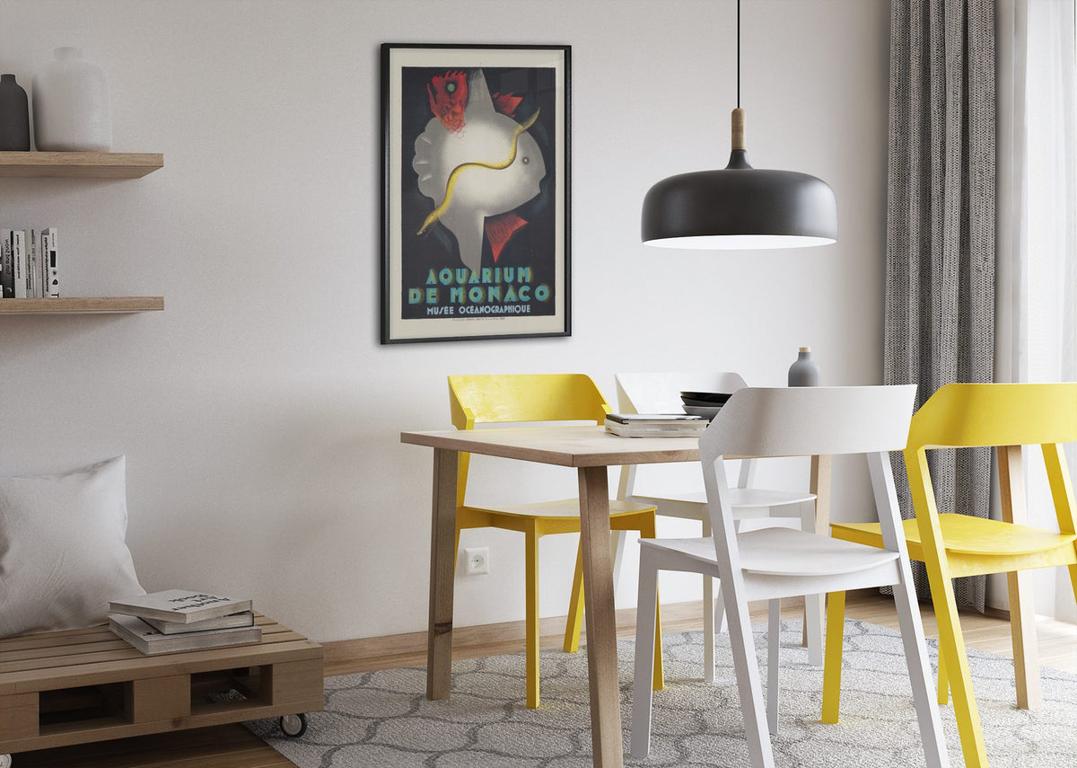 Aquarium de Monaco poster framed above a dining table