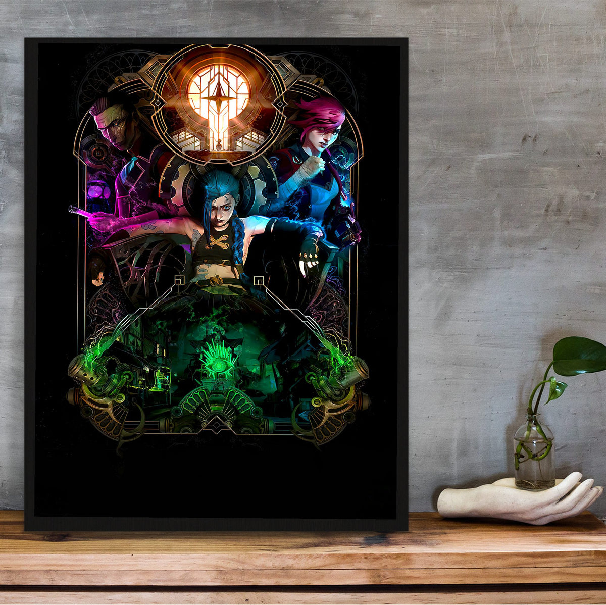 Arcane Hextech Gold Frame Art poster in a black frame on a wooden shelf against concrete