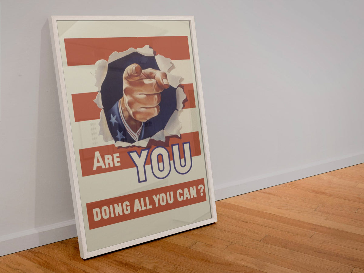 Are You Doing All You Can? poster in a white frame leaning against a wall