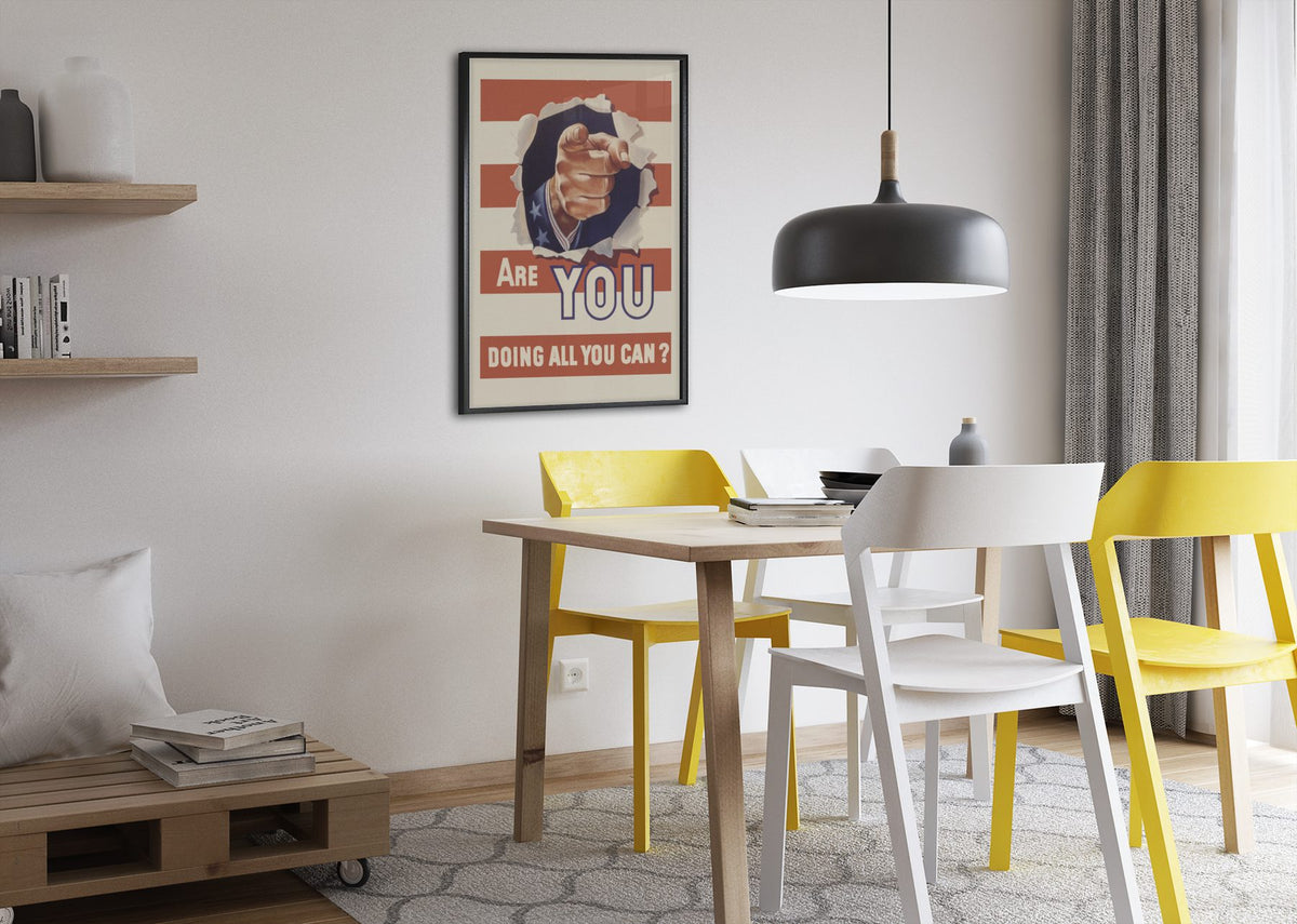 Are You Doing All You Can? poster framed above a dining table