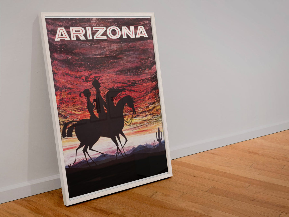 Arizona Desert Sunset poster in a white frame leaning against a wall