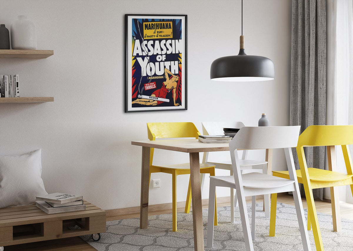Assassin of Youth poster framed above a dining table