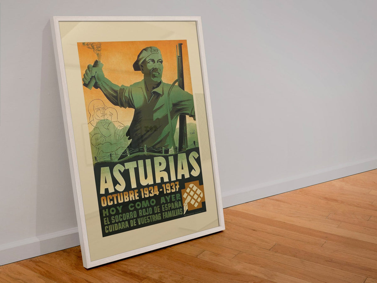Asturias 1934-1937 poster in a white frame leaning against a wall
