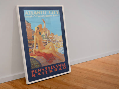 Atlantic City Pennsylvania Railroad poster in a white frame leaning against a wall