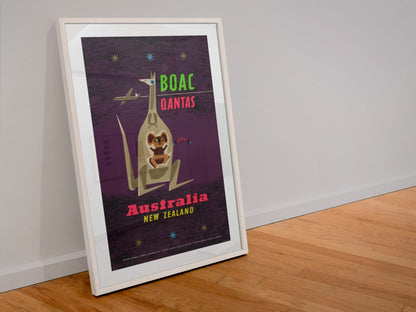 Australia New Zealand BOAC Qantas poster in a white frame leaning against a wall