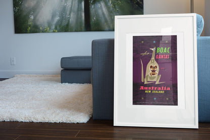 Australia New Zealand BOAC Qantas poster leaning beside a blue sofa