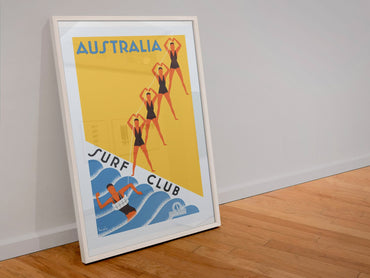 Australia Surf Club poster in a white frame leaning against a wall