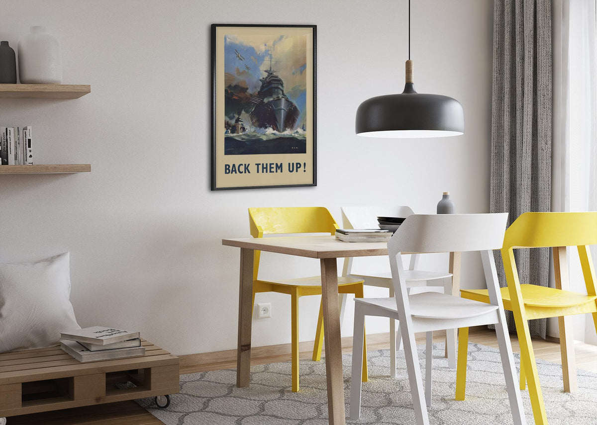 Back Them Up Battleship poster framed above a dining table