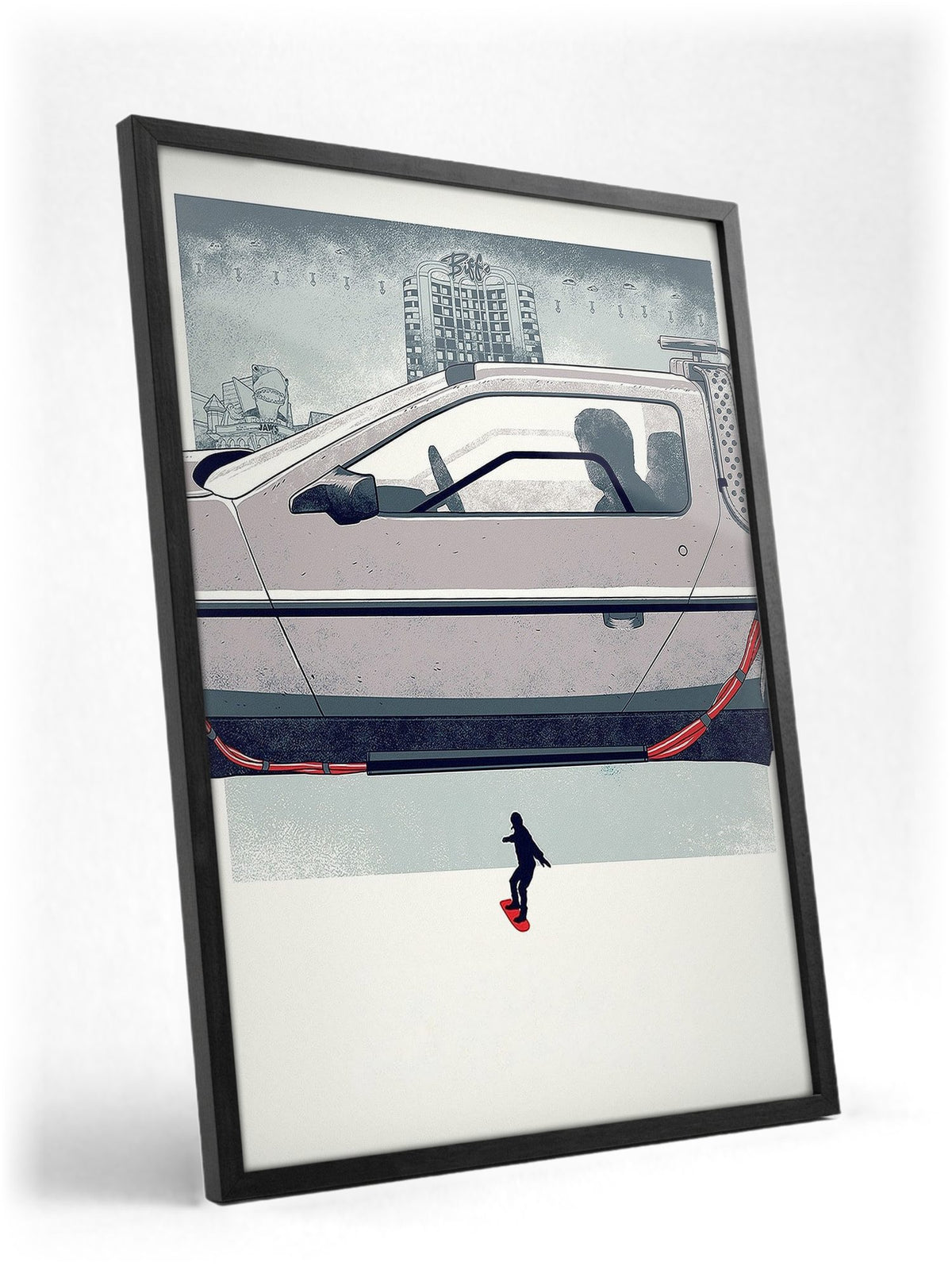 Back to the Future Part II (1989) Movie DeLorean Hover Art poster in a black frame with glass leaning against a wall