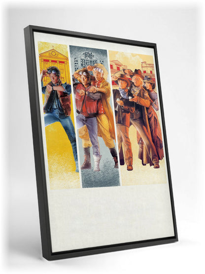 Back to the Future Trilogy Movie Triptych Art as a black floater framed canvas leaning against a wall
