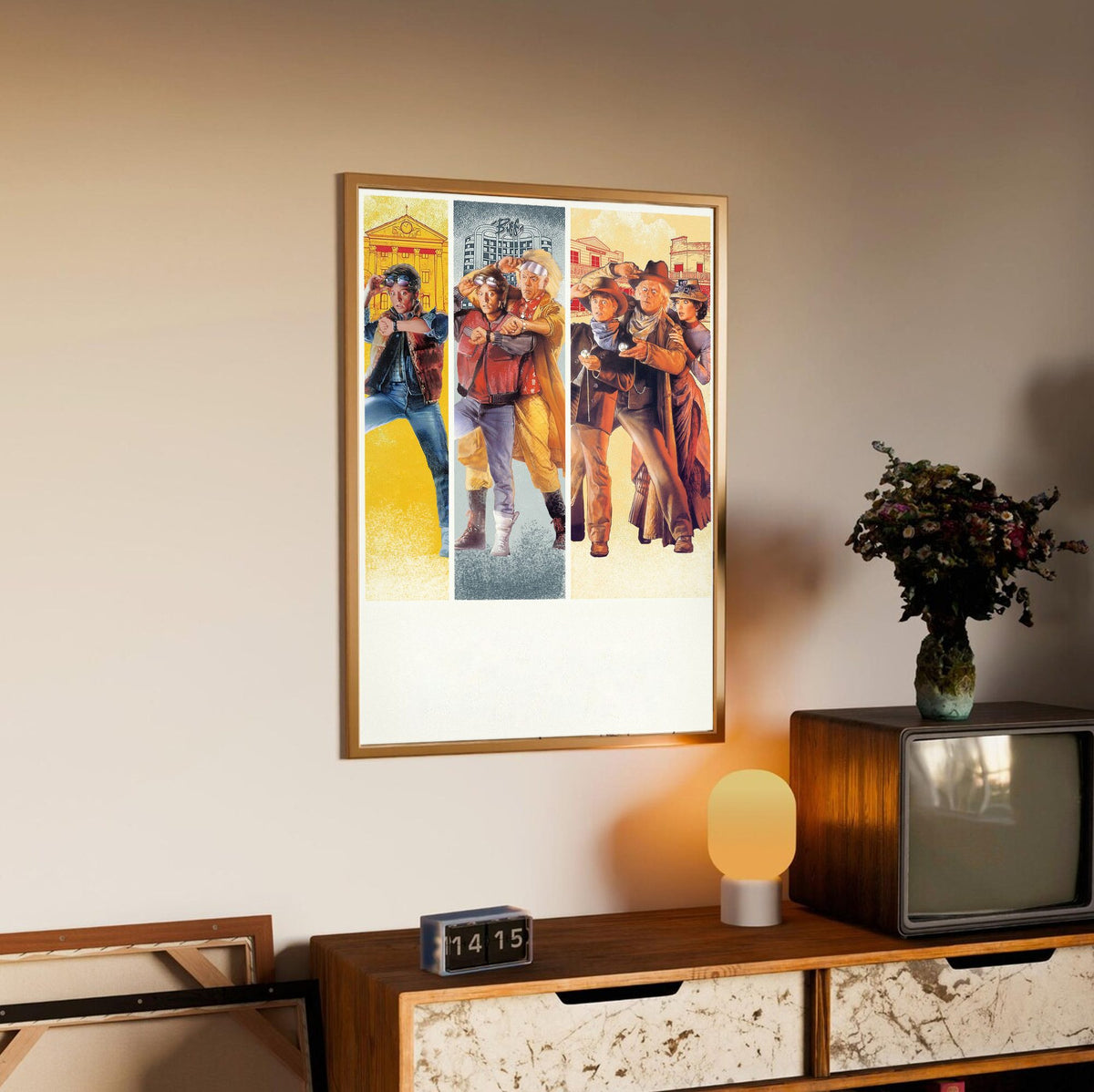 Back to the Future Trilogy Movie Triptych Art poster in an oak frame above a sideboard