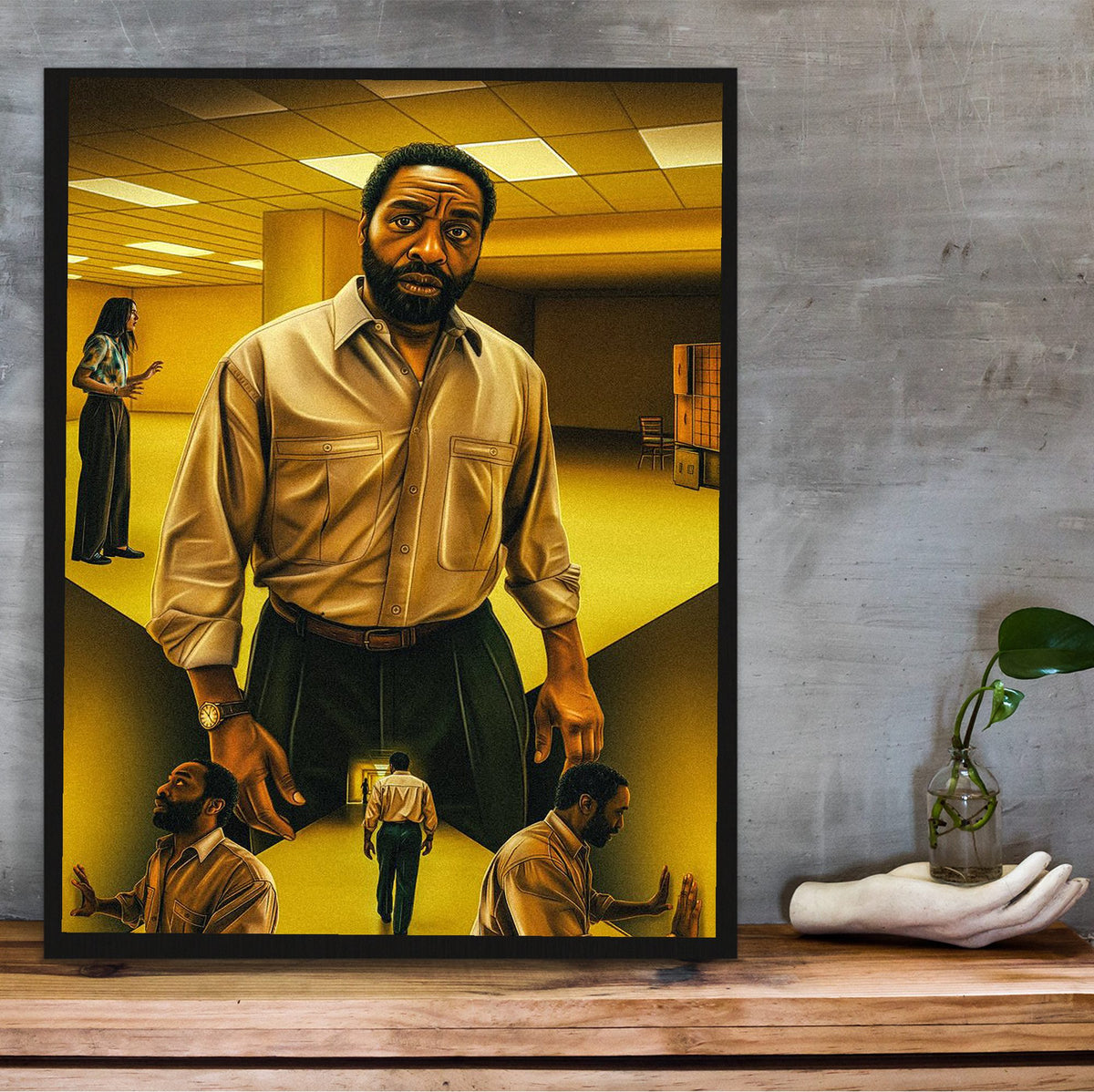 Backrooms (2026) Movie Key Art poster in a black frame on a wooden shelf against concrete