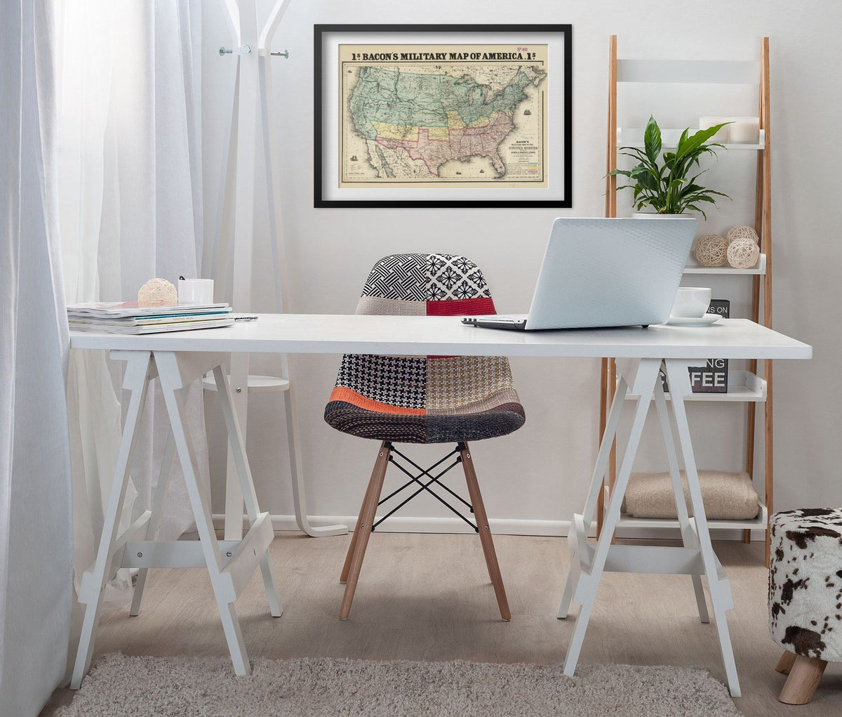 Bacon’s Military Map of America 1862 print framed above a white desk in a home office