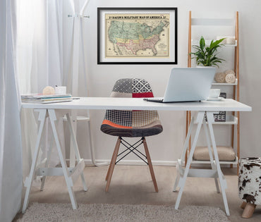 Bacon’s Military Map of America 1862 print framed above a white desk in a home office