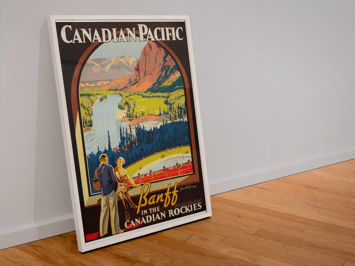 Banff Canadian Rockies poster in a white frame leaning against a wall