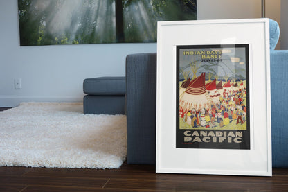 Banff Indian Days — Canadian Pacific poster leaning beside a blue sofa