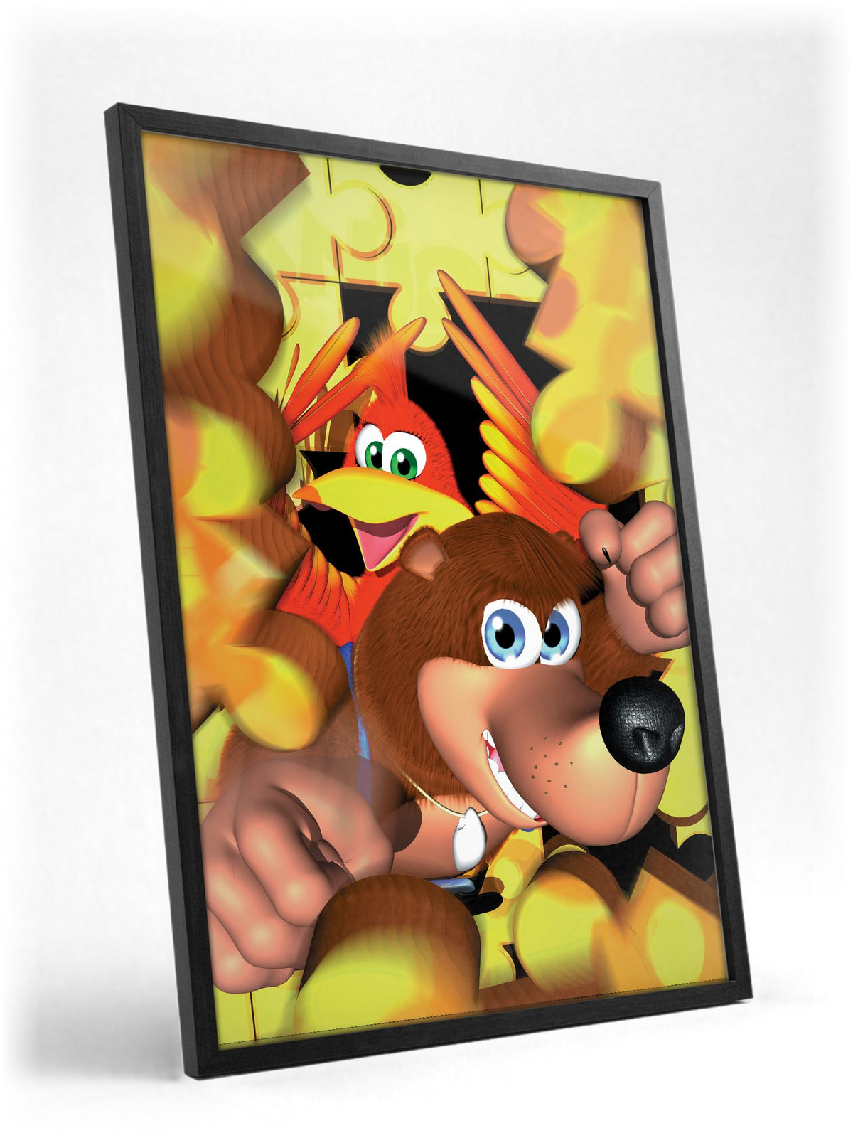 Banjo-Kazooie Magazine Cover Art poster in a black frame with glass leaning against a wall