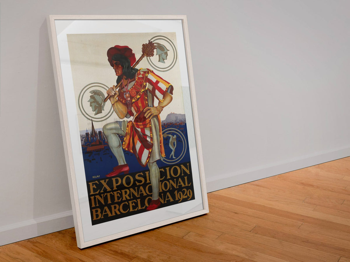 Barcelona Exposition 1929 poster in a white frame leaning against a wall