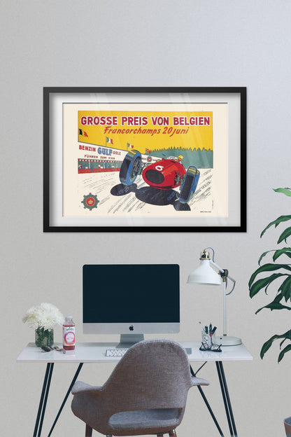 Belgian Grand Prix Francorchamps poster framed above a desk with a computer