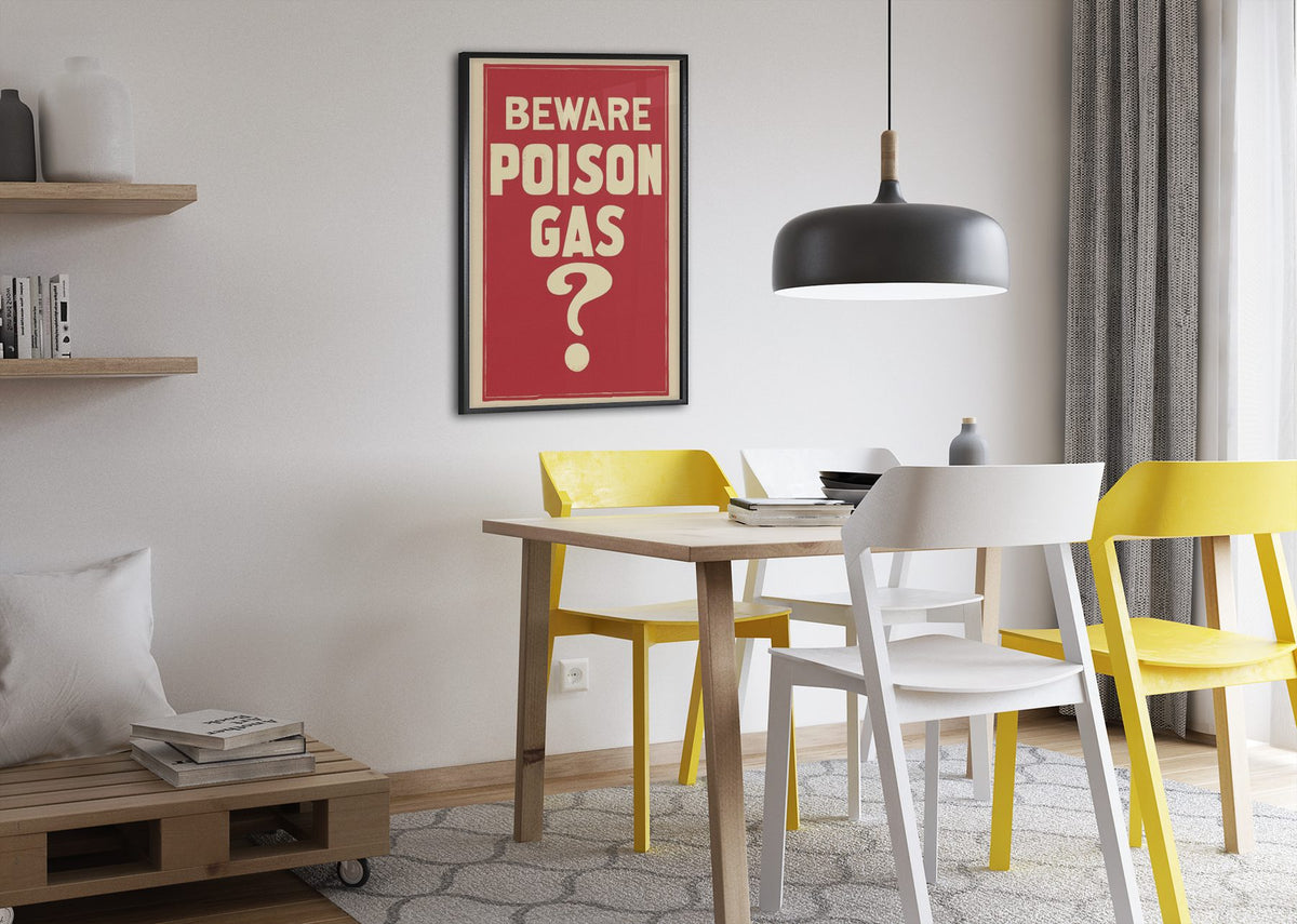 Beware Poison Gas poster framed above a dining table