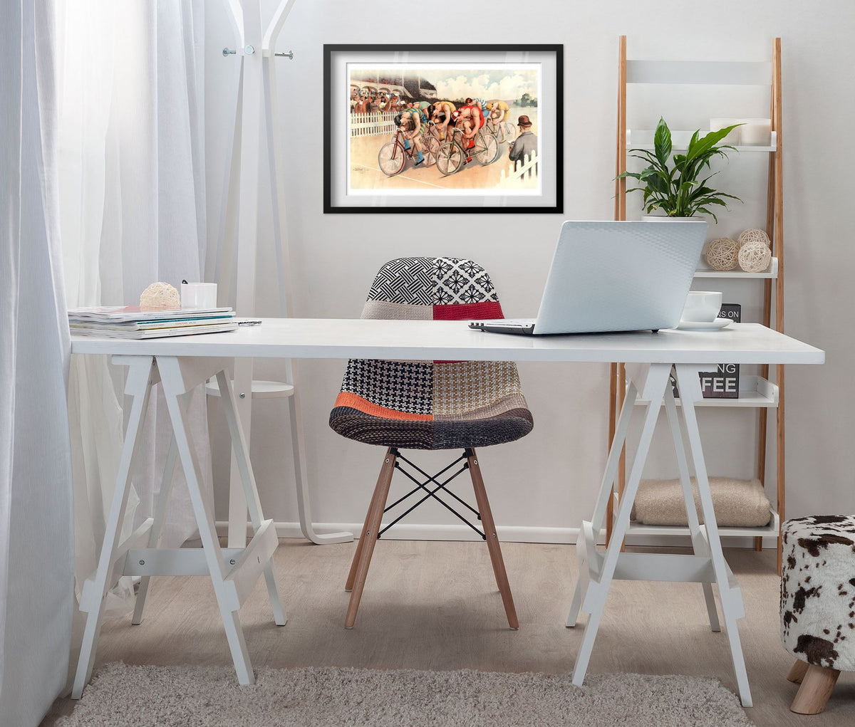 Bicycle Race poster framed above a white desk in a home office